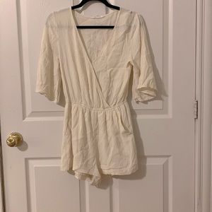 Cream romper with pockets